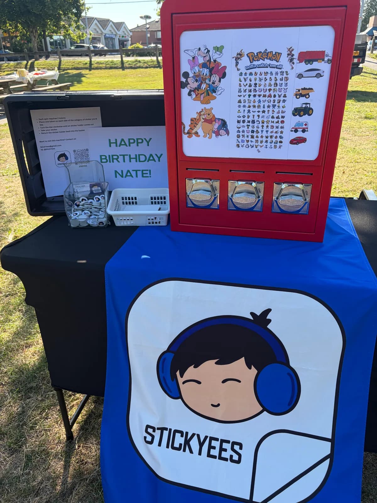 The StickYees insert-coin sticker machine, front view